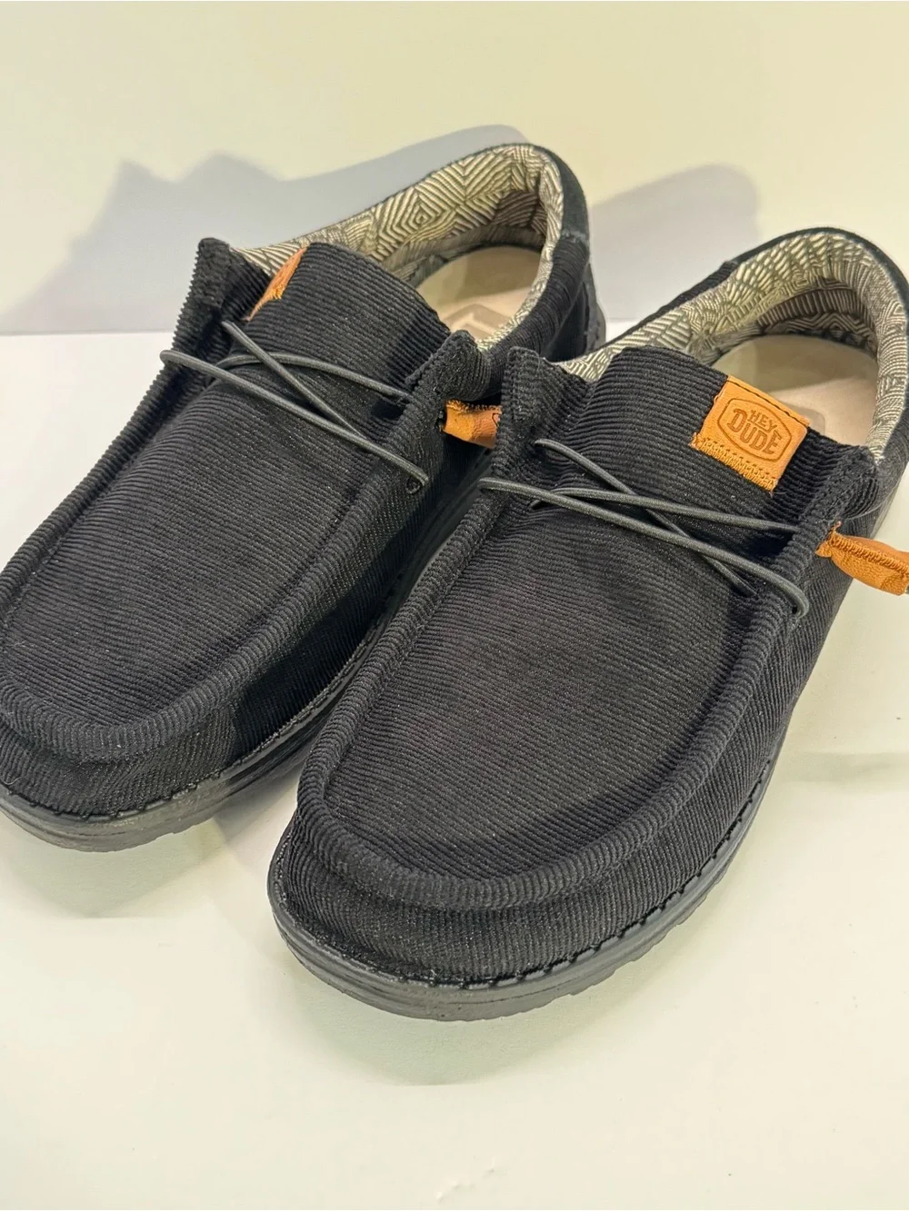 HEYDUDE Black Canvas Slip-On Loafers with Tan Accents